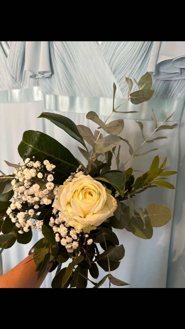 Elegant wedding hair styling at Roots 'N' Ends